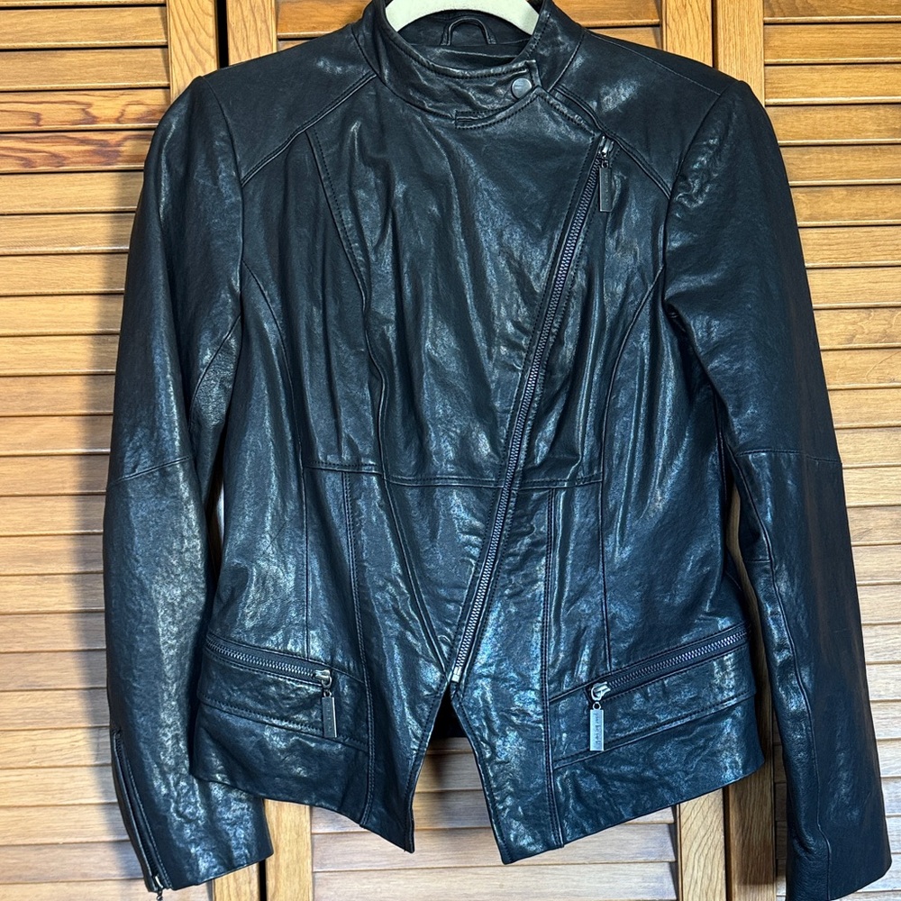 Beautiful black leather coat by peace love world
